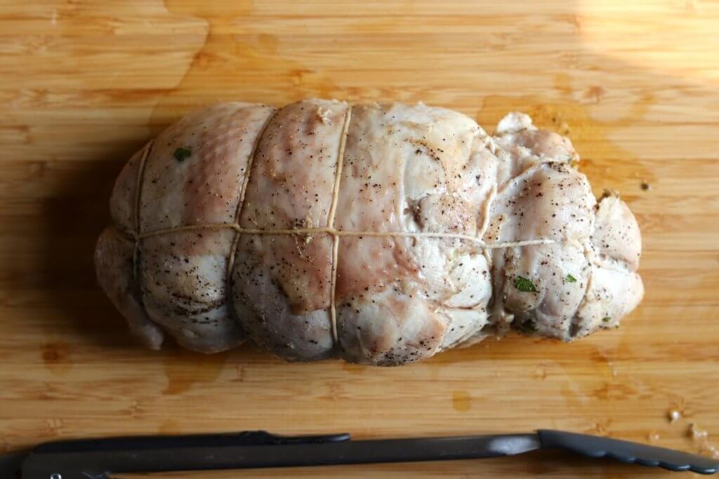 turkey roulade on cutting board